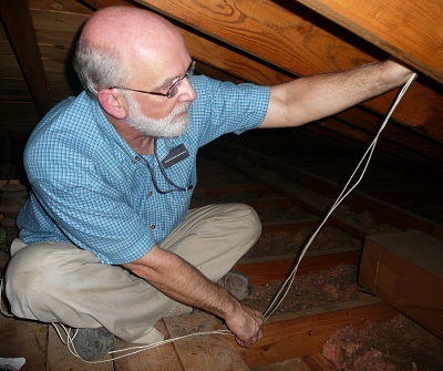 Julian Gray, working in the attic